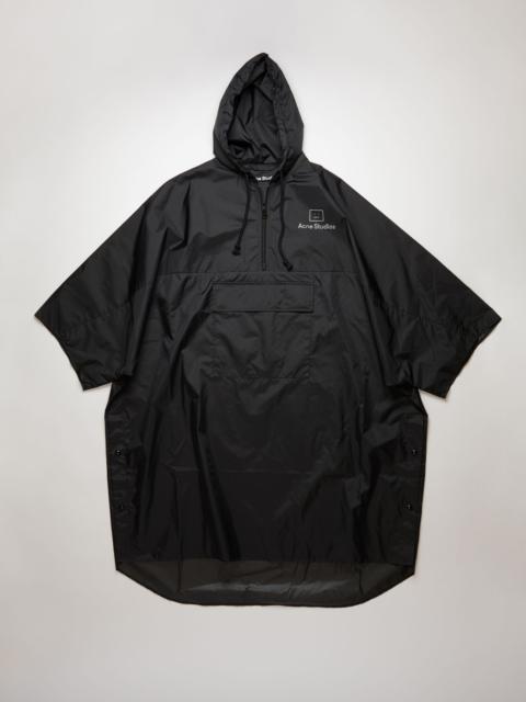 Acne Studios Reflective face motif poncho black