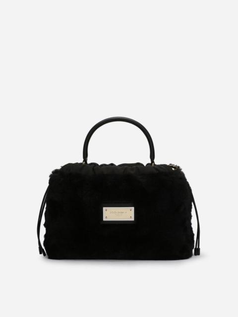 Calfskin and faux fur cover bag