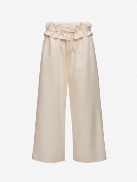 MAGDA BUTRYM Low-rise ruffled waist trousers in cream