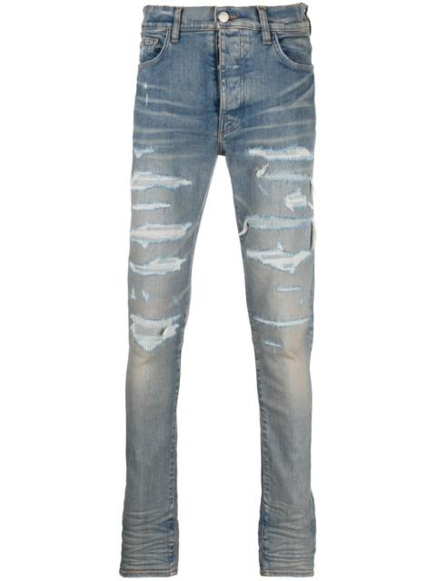 AMIRI distressed-effect skinny jeans