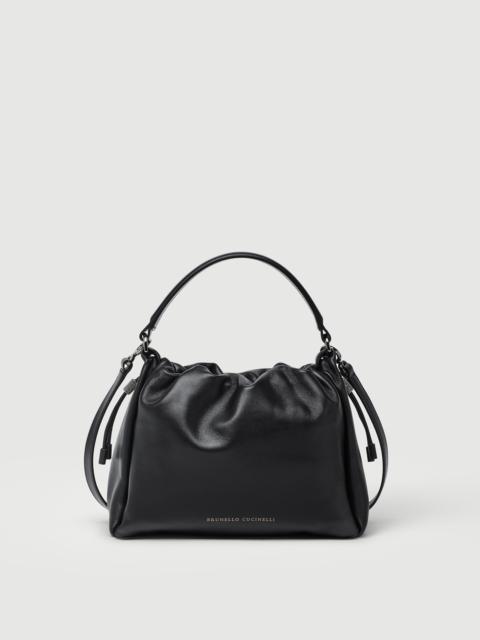 Brunello Cucinelli Mellow small bucket bag in soft leather with monili