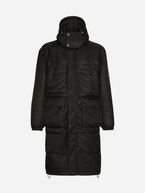 Nylon jacket with hood and branded tag