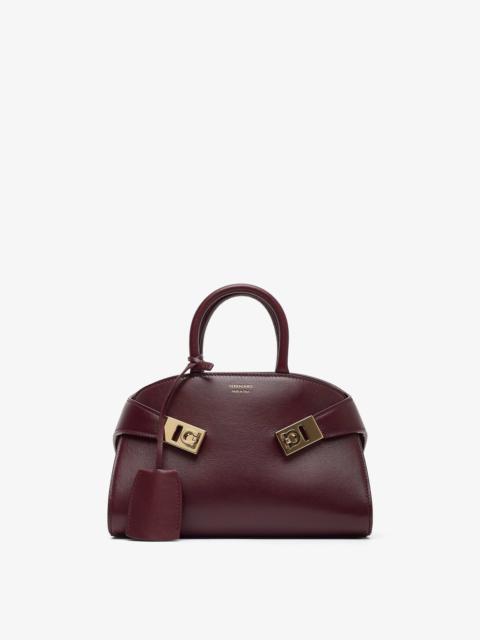 Hug mini soft plum top handle bag