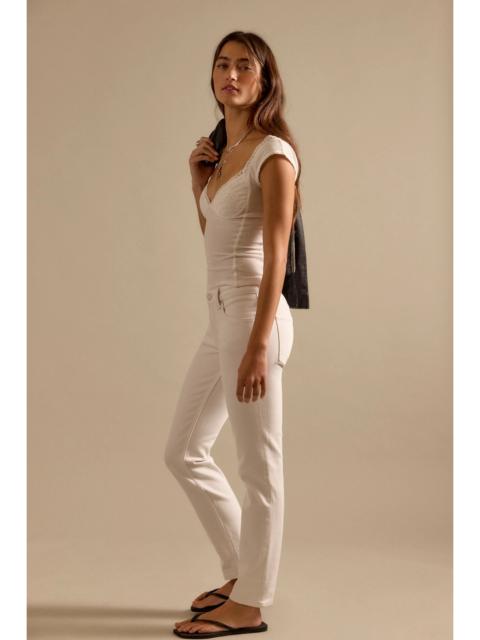 FREE PEOPLE We The Free Oracle Low-Rise Slim Straight Jeans