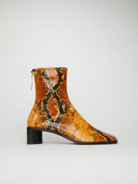Acne Studios Python leather boots orange/black