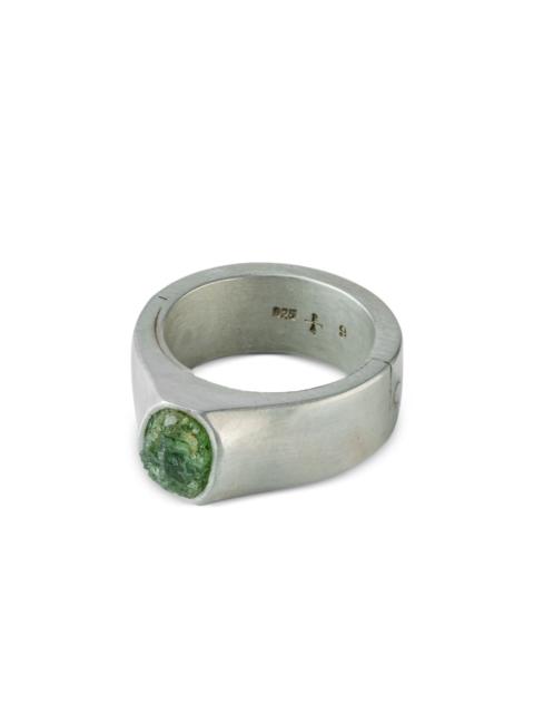 Parts of Four terrestrial surfaced peridot ring