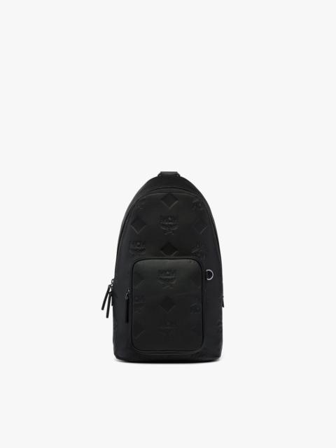 MCM Aren Sling Bag in Embossed Monogram Leather