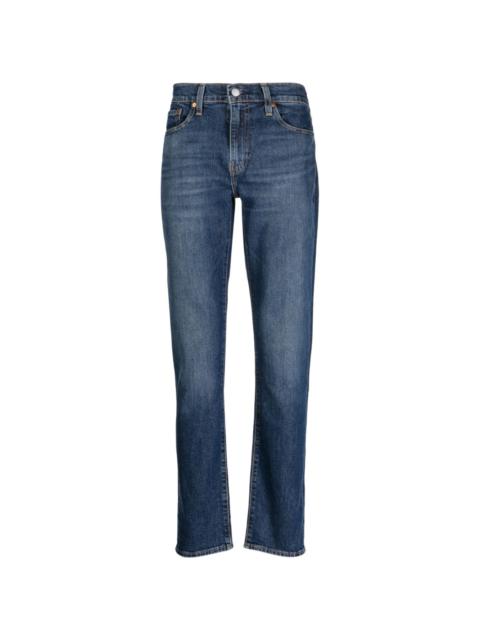 slim-fit cotton-blend jeans