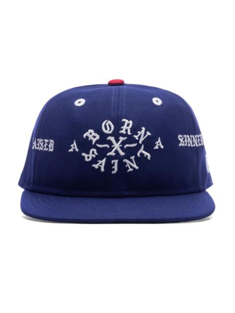 SAINT M×××××× SAINT MICHAEL X BORN X RAISED X NEW ERA BORN SAINT CAP - BLUE
