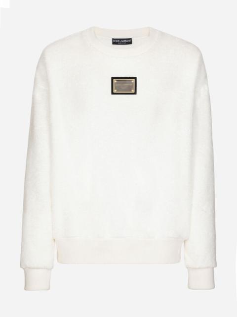 Round-neck terrycloth sweatshirt with logo tag