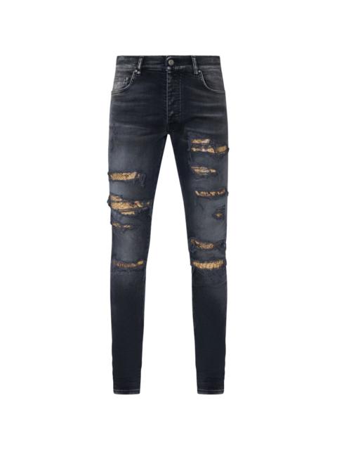AMIRI Snake Thrasher denim skinny jeans