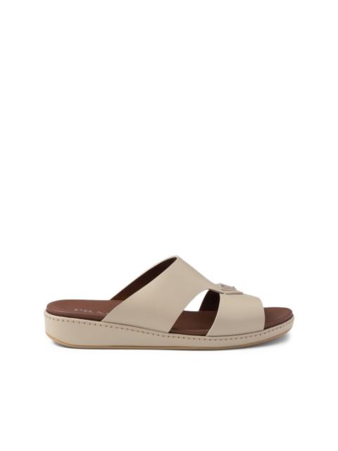 Prada enameled triangle leather slides