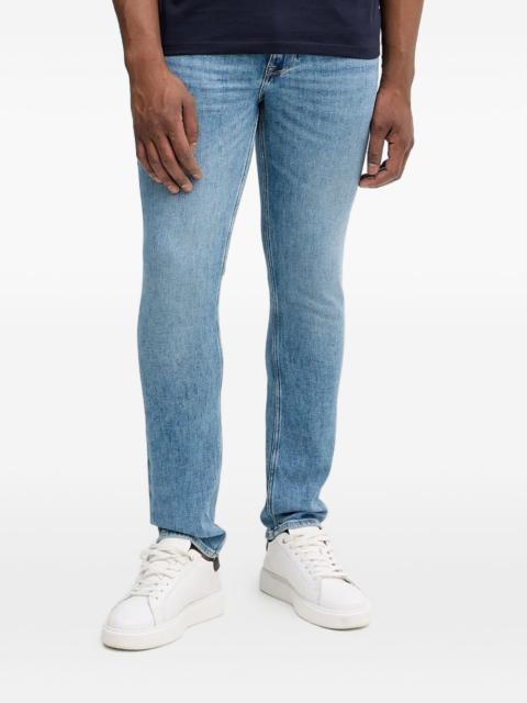 GUESS USA Finnley logo patch jeans