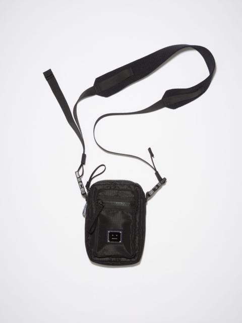 Acne Studios Crossbody face bag - Black