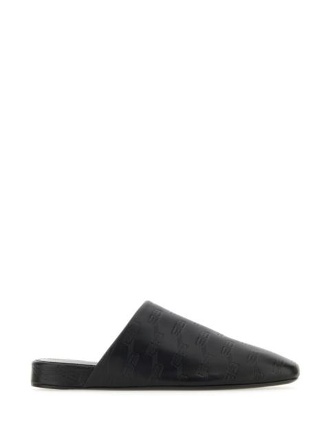 BALENCIAGA Black leather slippers