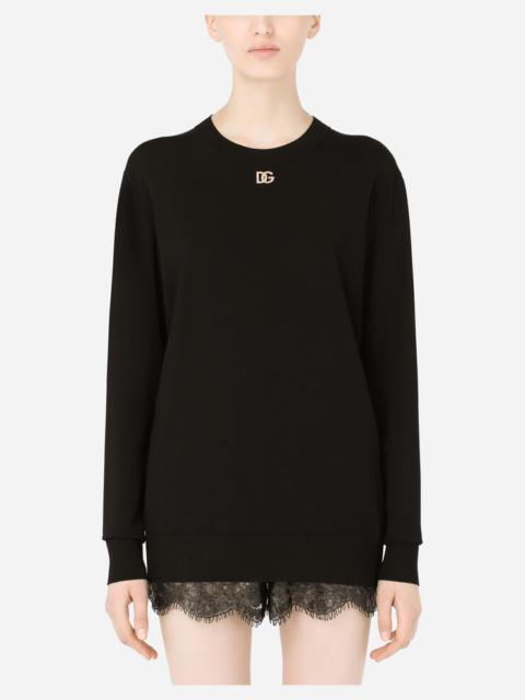 Dolce & Gabbana Viscose sweater with crystal DG embellishment
