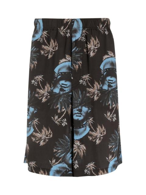 UNDERCOVER ROSE-PRINT BERMUDA SHORTS