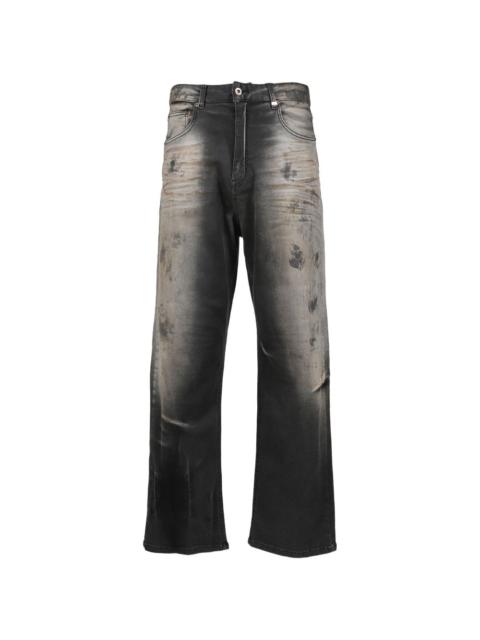 We11done dirty-washed jeans