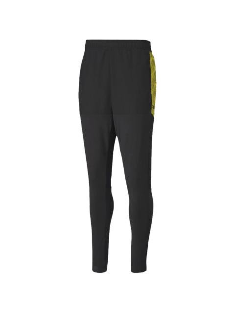 PUMA yellow-detail track pants