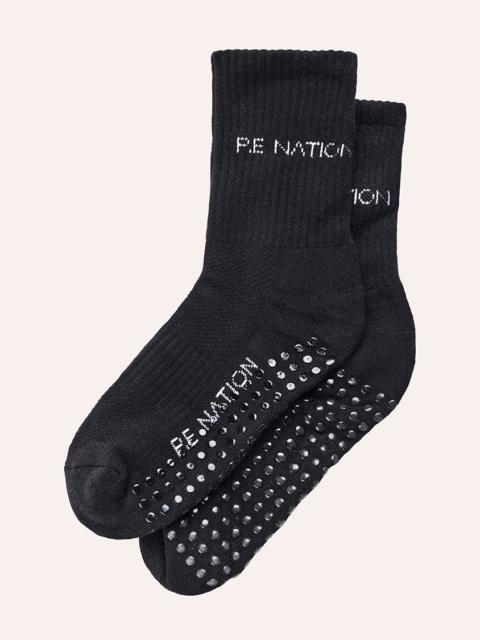 P.E NATION SIGNATURE GRIP CREW SOCK IN BLACK & WHITE