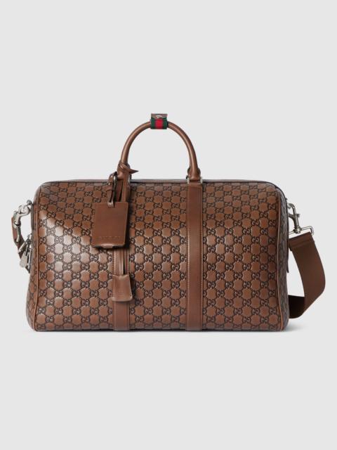 GUCCI GG Emblem medium duffle bag