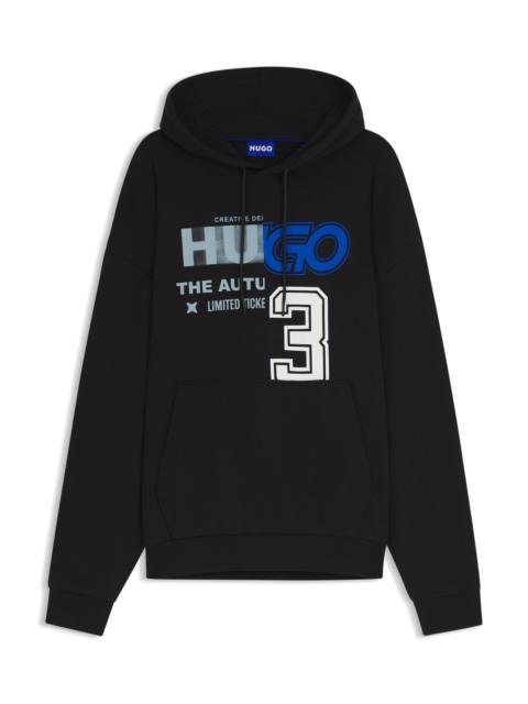 HUGO COTTON-TERRY HOODIE WITH MIXED ARTWORK PRINT