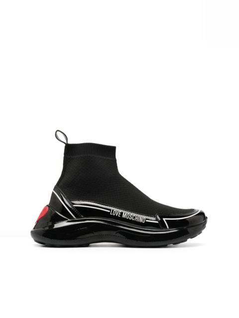 Moschino logo-embossed high-top sneakers
