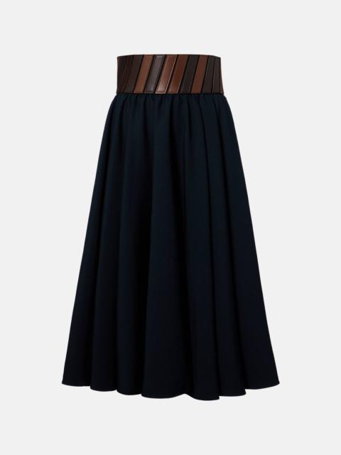 Alaïa Leather-trimmed wool midi skirt