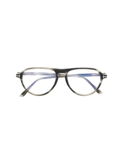 tortoiseshell pilot-frame glasses