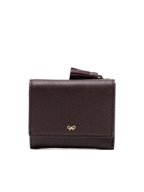 Anya Hindmarch peeping-eyestassel trifold leather wallet