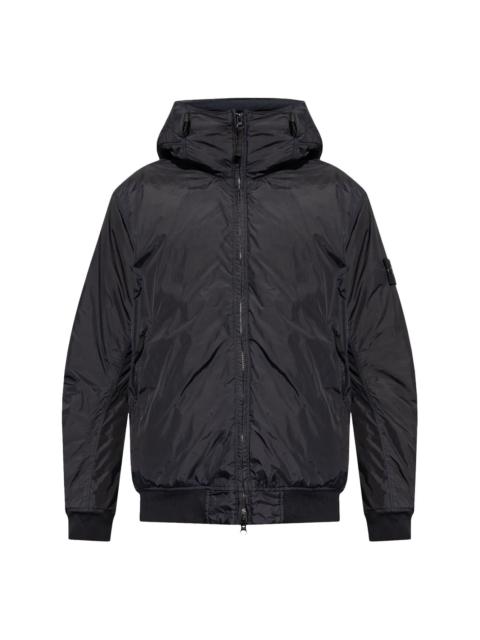 Compass-badge hooded windbreaker