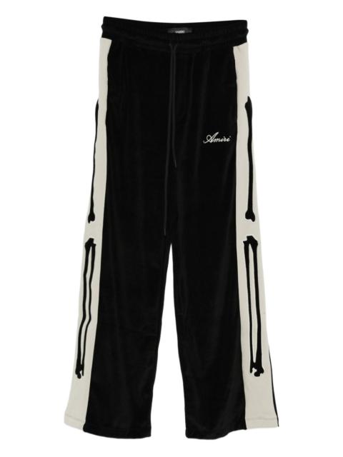 AMIRI Bones velvet-effect track pants