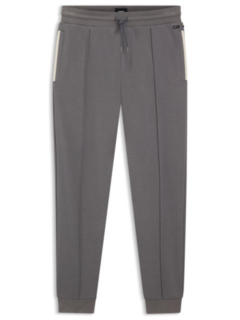 BOSS CONTRAST-BINDING TRACKSUIT BOTTOMS IN A COTTON BLEND