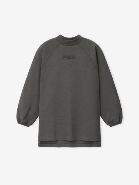 ESSENTIALS Pique 90s Relaxed Mockneck Raglan LS Tee