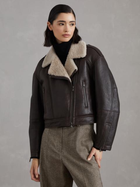 Waxed shearling biker jacket with shiny details