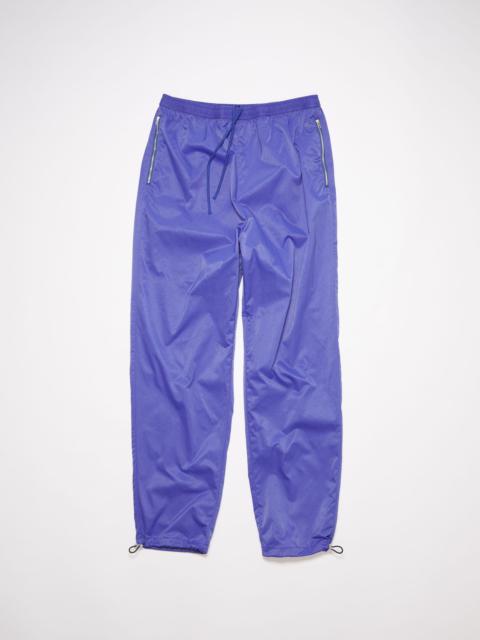 Acne Studios Nylon trousers - Faded blue