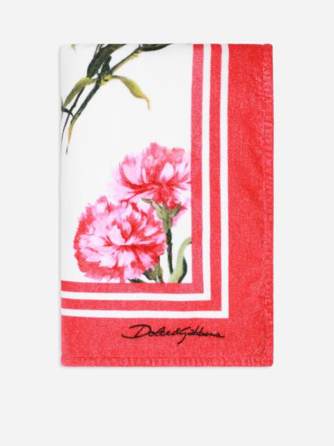 Carnation-print terrycloth beach towel