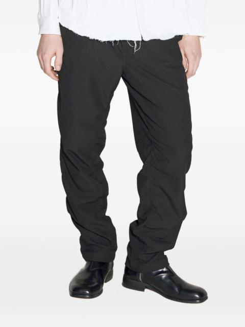 UNDERCOVER tassel-detail trousers