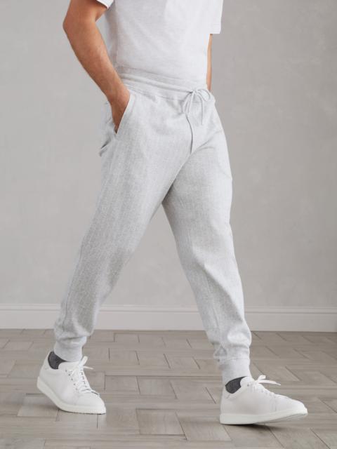 Brunello Cucinelli Cotton, cashmere and silk chalk stripe French terry double cloth trousers with elasticated cuffs