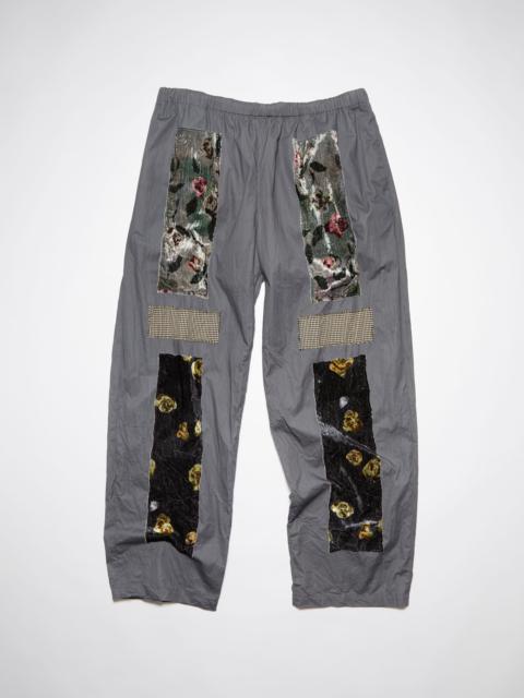 Acne Studios Loose fit patch trousers - Grey