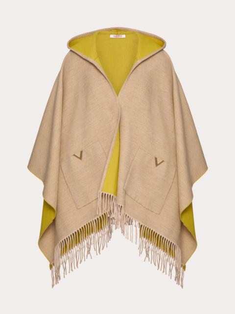V DETAIL WOOL AND CASHMERE PONCHO WITH HOOD AND METAL V APPLIQUÉ