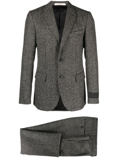 single-breasted tweed suit