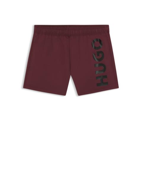 HUGO SWIM SHORTS WITH VERTICAL LOGO PRINT
