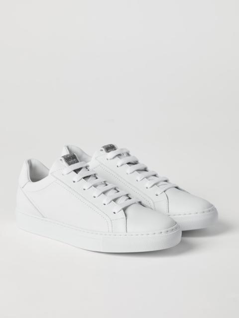 Matte calfskin sneakers with precious detail