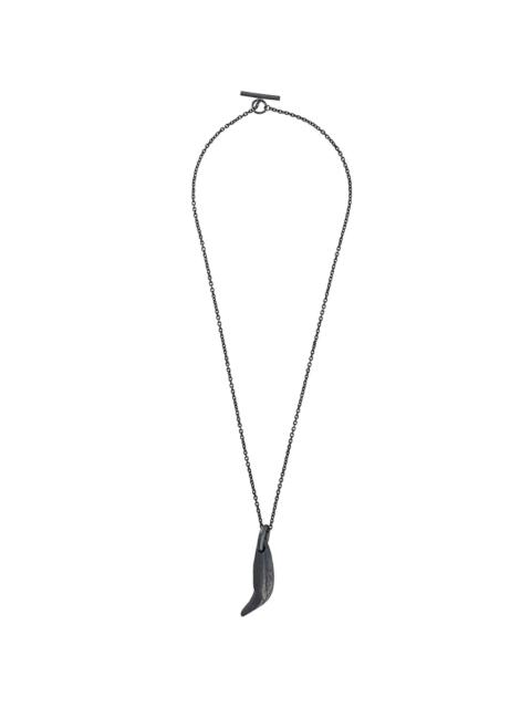 Parts of Four Bear Tooth necklace