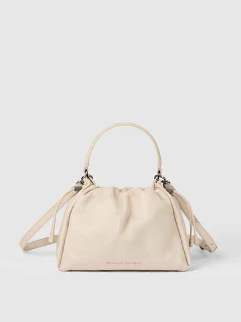 Brunello Cucinelli Mellow small bucket bag in soft leather with monili