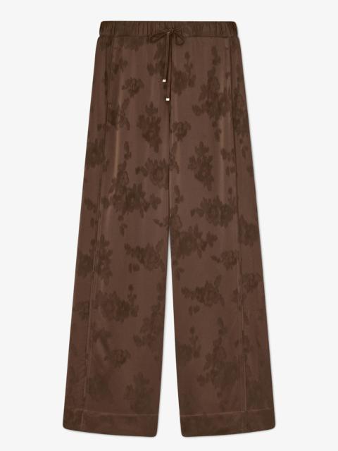 GANNI PANTS IN BROWN SATIN