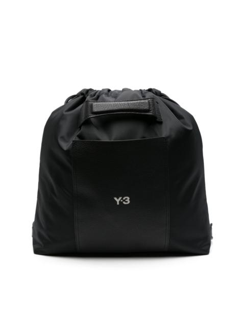 x Lux logo-debossed backpack
