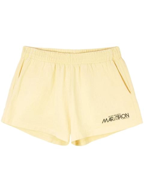 Sporty & Rich Marathon Disco track shorts
