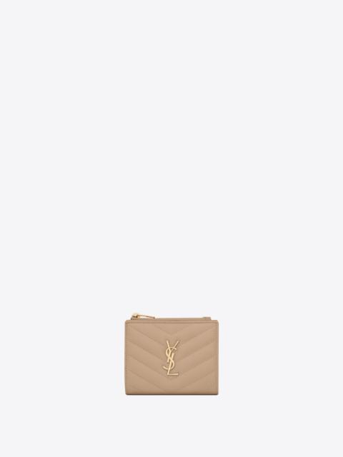 cassandre saint laurent matelassé bi-fold wallet in grain de poudre embossed leather